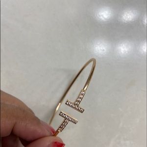 Tiffany T bracelet crafted in 18k rose gold.